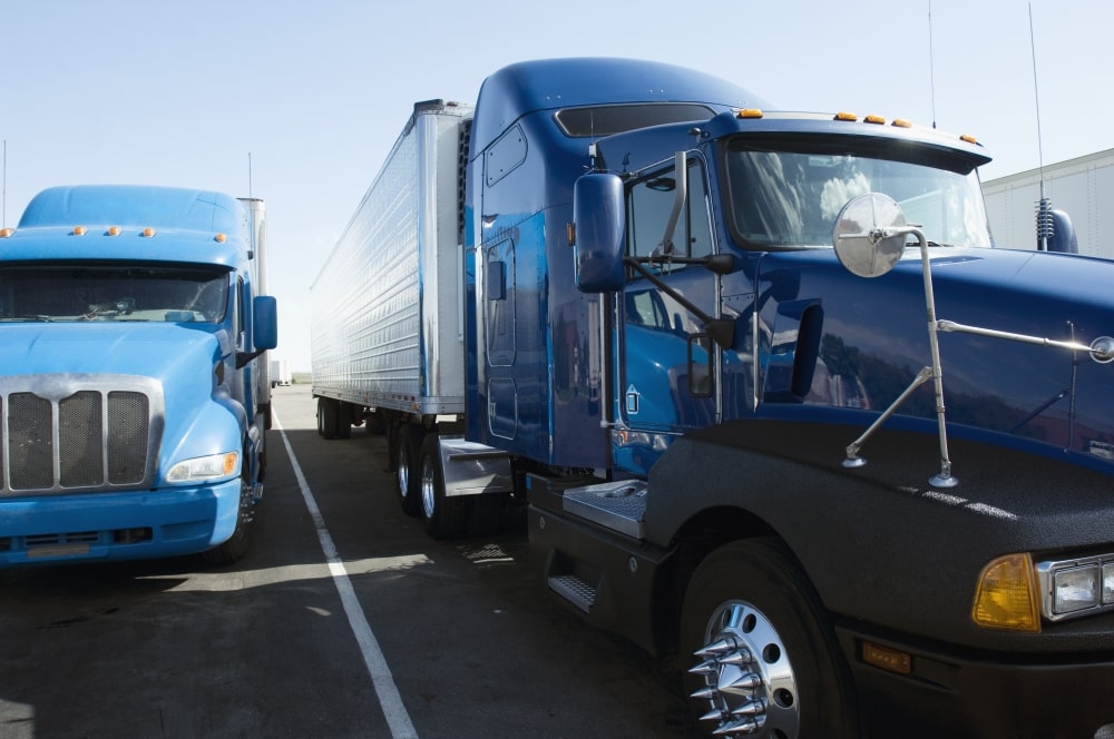 A small trucking fleet on a parking